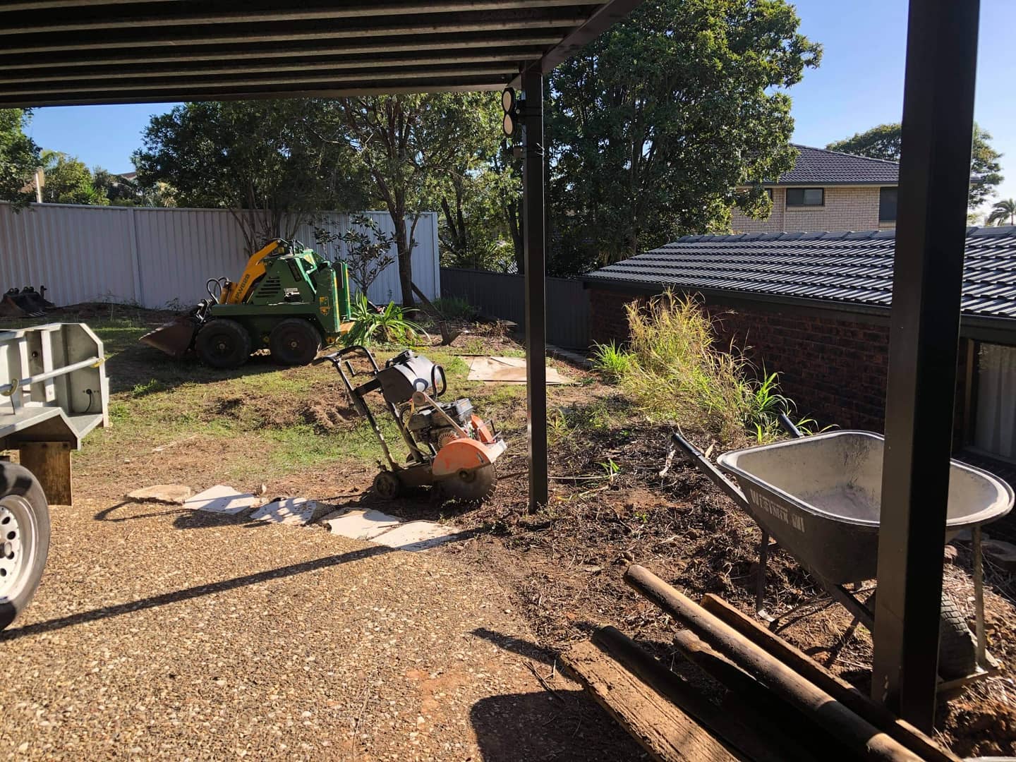 Retaining, turfing, fencing, concreting and new side entrance