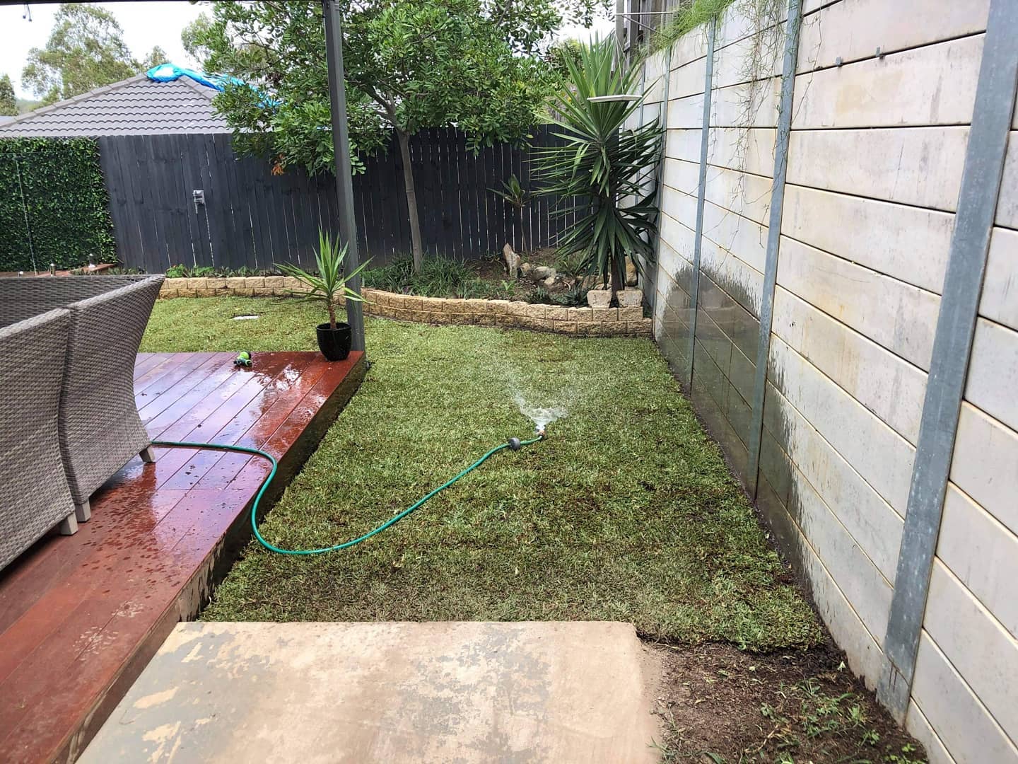 Stepping stone paving and a returf in Springfield lakes (Back and side)